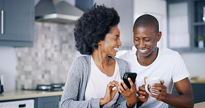 Buy stock photo Happy, black couple and phone with coffee for morning, browsing or social media together at home. African, man and woman with smile or mug on mobile smartphone for breakfast, online news or email