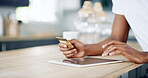 Man, hands and credit card with tablet in home, wireless transaction and online shopping. Male person, banking website and ecommerce for checkout order, payment and kitchen for finance money app