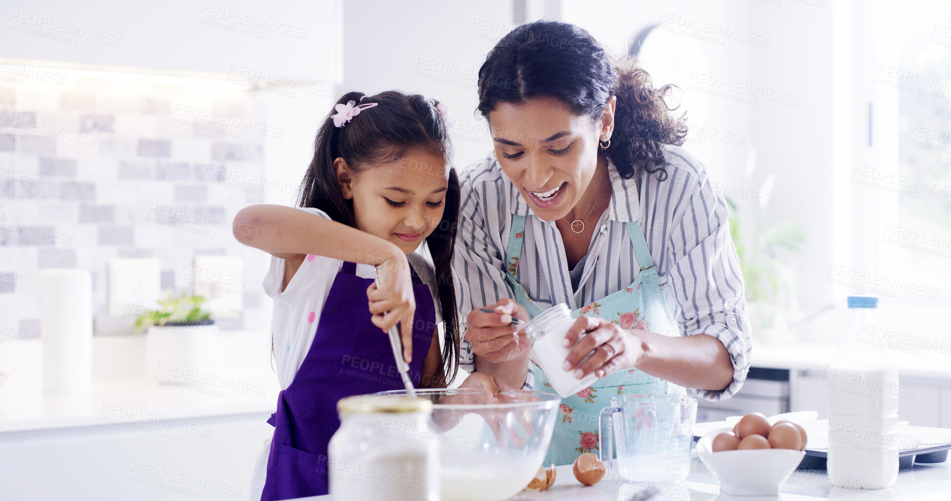 Buy stock photo Teaching, mother and girl with kitchen, baking and learning with ingredients for pastry or dessert cake. Smile, happy mom and cooking daughter help for pudding, cookies or recipe prepare in home