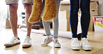 People, child and legs in new home for moving, real estate opportunity and property investment. Parents, shoes or young kid in living room for relocation, apartment and teddy bear with boxes in house