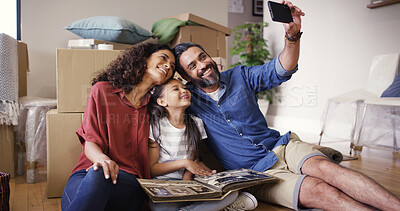 Buy stock photo Family, real estate and people with selfie in new home for property relocation, moving in memory and unpacking. Parents, child and photography on floor for milestone, social media post and insurance