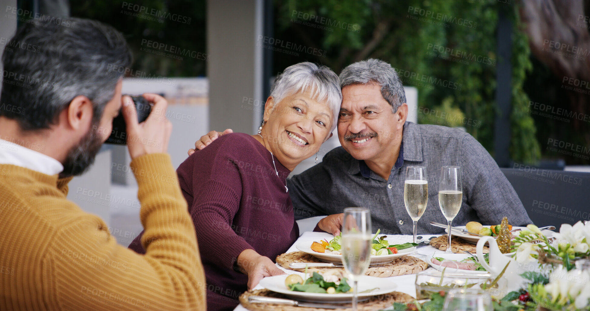 Buy stock photo Senior, grandparents and family with food, picture or love with smile, Christmas or social gathering. Elderly, home or people with feast, healthy meal and photograph for happy memory or celebration