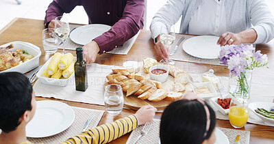 Buy stock photo Family, hands and table with food for lunch, meal or thanks giving dinner together at home. Children, parents and hungry people bonding with platter of bread for holiday feast, eating or dining