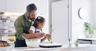 Buy stock photo Family, dad and child with kitchen, help baking and learning with ingredients for dessert cake or bonding. Smile, happy father and cooking daughter for support, cupcakes or recipe preparation in home