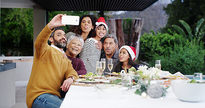 Buy stock photo Christmas, smile and family with selfie at lunch by home for holiday memory, profile picture update or funny face. People, parents or grandparents with kids on patio for social event, love or bonding