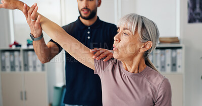 Buy stock photo Stretch arm, physical therapy and senior woman or patient at consultation for problem, inflammation or arthritis. Person, chiropractor and exercise for pain, rehabilitation and recovery of muscle