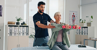 Buy stock photo Physiotherapist, help or senior woman with dumbbells for rehabilitation, muscle exercise or body health. Shoulder mobility, weights or physiotherapy client with physical recovery, support or balance
