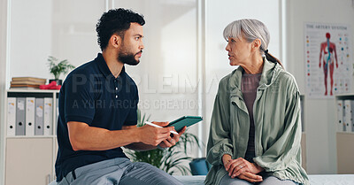 Buy stock photo Tablet, physical therapy and senior woman at consultation for problem, inflammation or arthritis. Person, patient or chiropractor and discussion for injury, rehabilitation and recovery of muscle