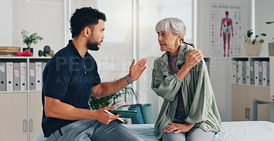 Buy stock photo Tablet, physical therapy and senior woman with shoulder pain at consultation for problem or arthritis. Person, patient or chiropractor and discussion for injury, rehabilitation and recovery of muscle