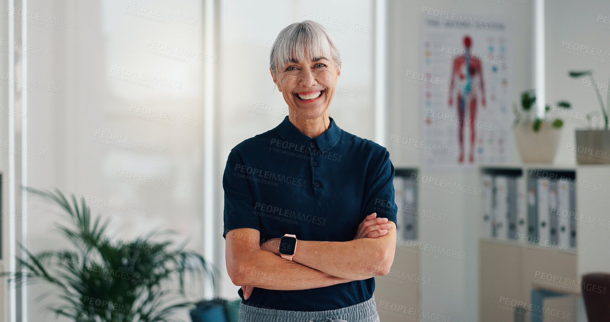 Buy stock photo Woman, physiotherapist and portrait in office with confidence, career pride and healthcare service. Mature chiropractor, happy and about us in practice for reflexology, arms crossed and physiotherapy