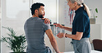 Physical therapy, shoulder pain and patient man at consultation for problem or inflammation. Person, chiropractor and talking of injury, rehabilitation and recovery of joint or muscle damage