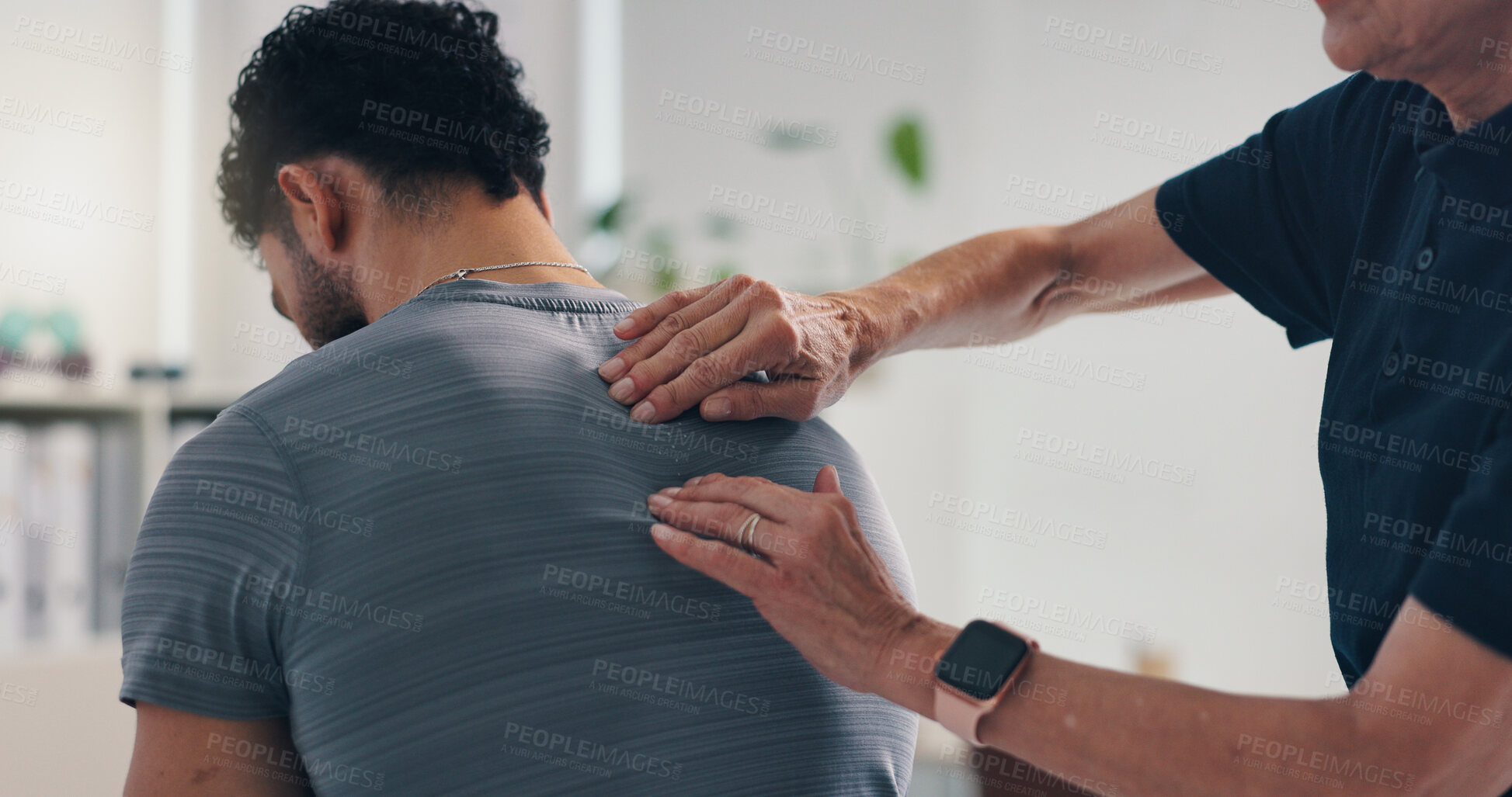 Buy stock photo Physical therapy, back massage and hands on patient man at consultation for problem or inflammation. Person, chiropractor and touch for injury, rehabilitation and recovery of spinal or muscle damage