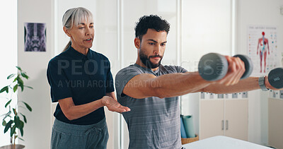 Buy stock photo Physiotherapist, woman or man with dumbbells for sports recovery, muscle exercise or body health. Mobility, client or stretching with weights for fitness, physical rehabilitation or help with balance