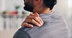 Pain, shoulder and man with hand on body for tendon tear problem, inflammation or arthritis. Person, closeup and health issue of injury, hurt or risk of weak muscle damage and physical discomfort