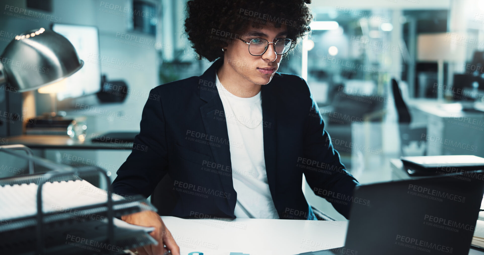 Buy stock photo Night, paperwork and man with laptop in office for business, finance management and budget review. Accountant, technology and profit report in agency for audit deadline, tax and graphs statistics