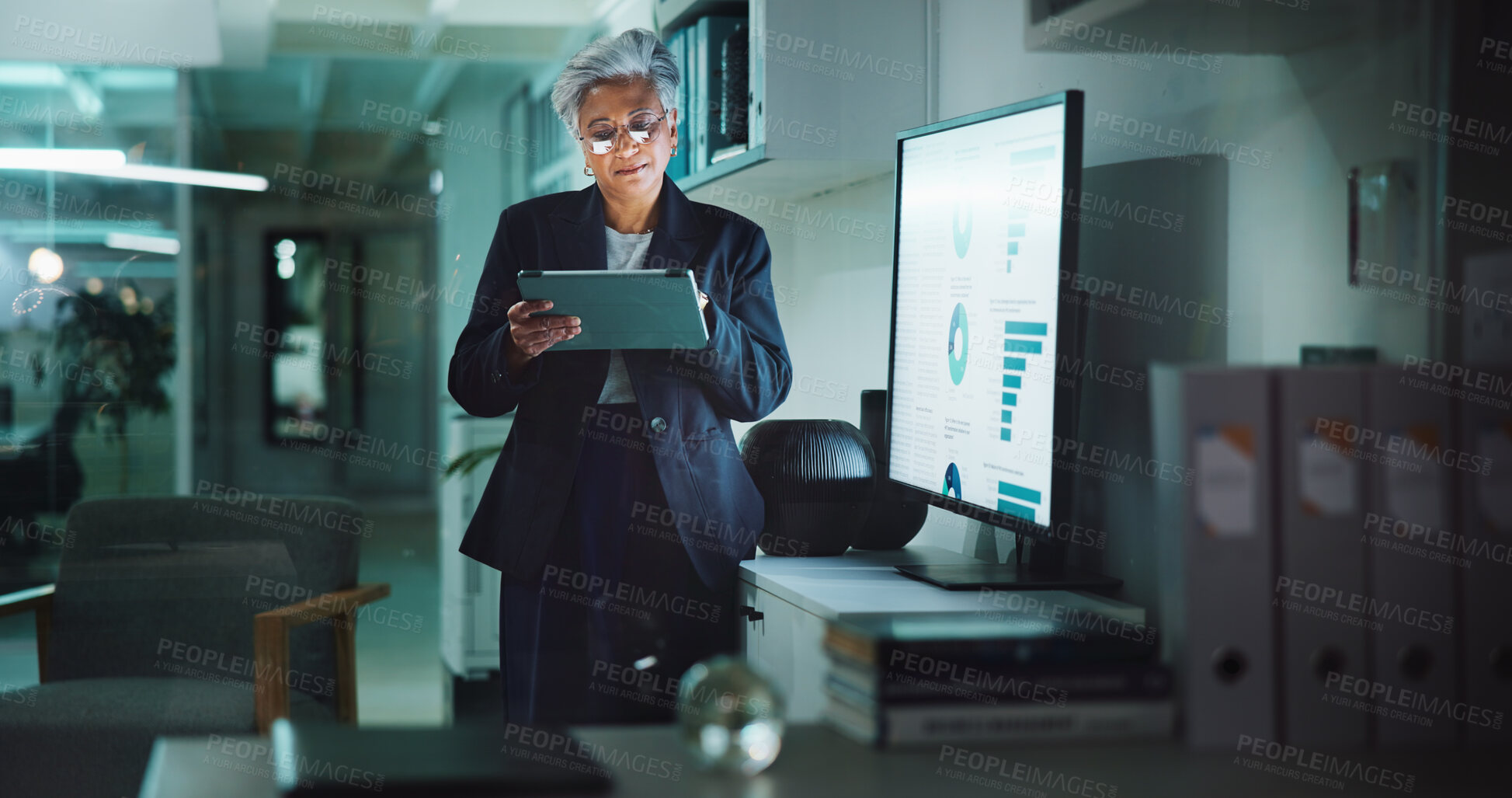 Buy stock photo Statistics, tablet and infographic with business woman in office for profit, accounting graph or budget research. Revenue charts, data analysis and sales review with mature person by monitor at night