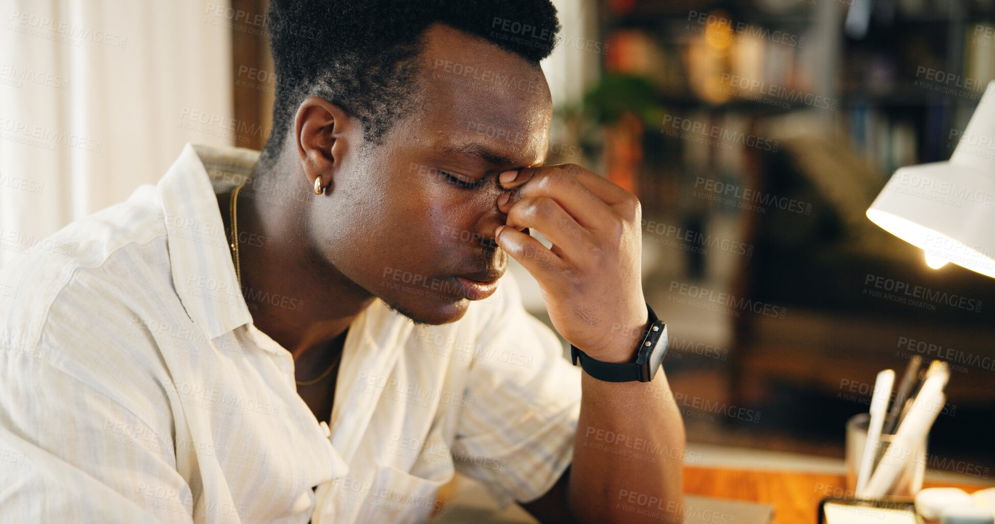 Buy stock photo Black man, student and headache in home for studying, mistake or frustrated with education course. Academic, anxiety or stress in lounge for project deadline, brain fog or overwhelmed by college debt