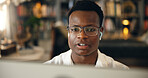 Black man, earphones or night with computer for journalism, research or history at library. African, male person or journalist with glasses or technology for online learning or education at book shop