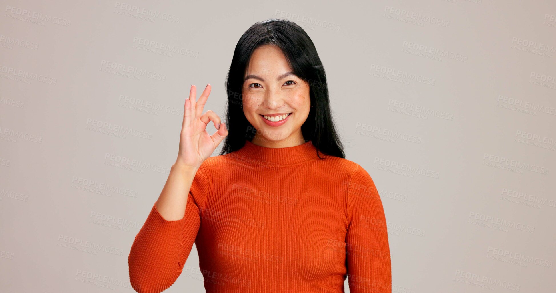 Buy stock photo Asian woman, smile and ok sign for studio portrait, emoji and decision with agreement by background. Girl, person and model with pride with icon, symbol and happy for choice with confidence in Taiwan