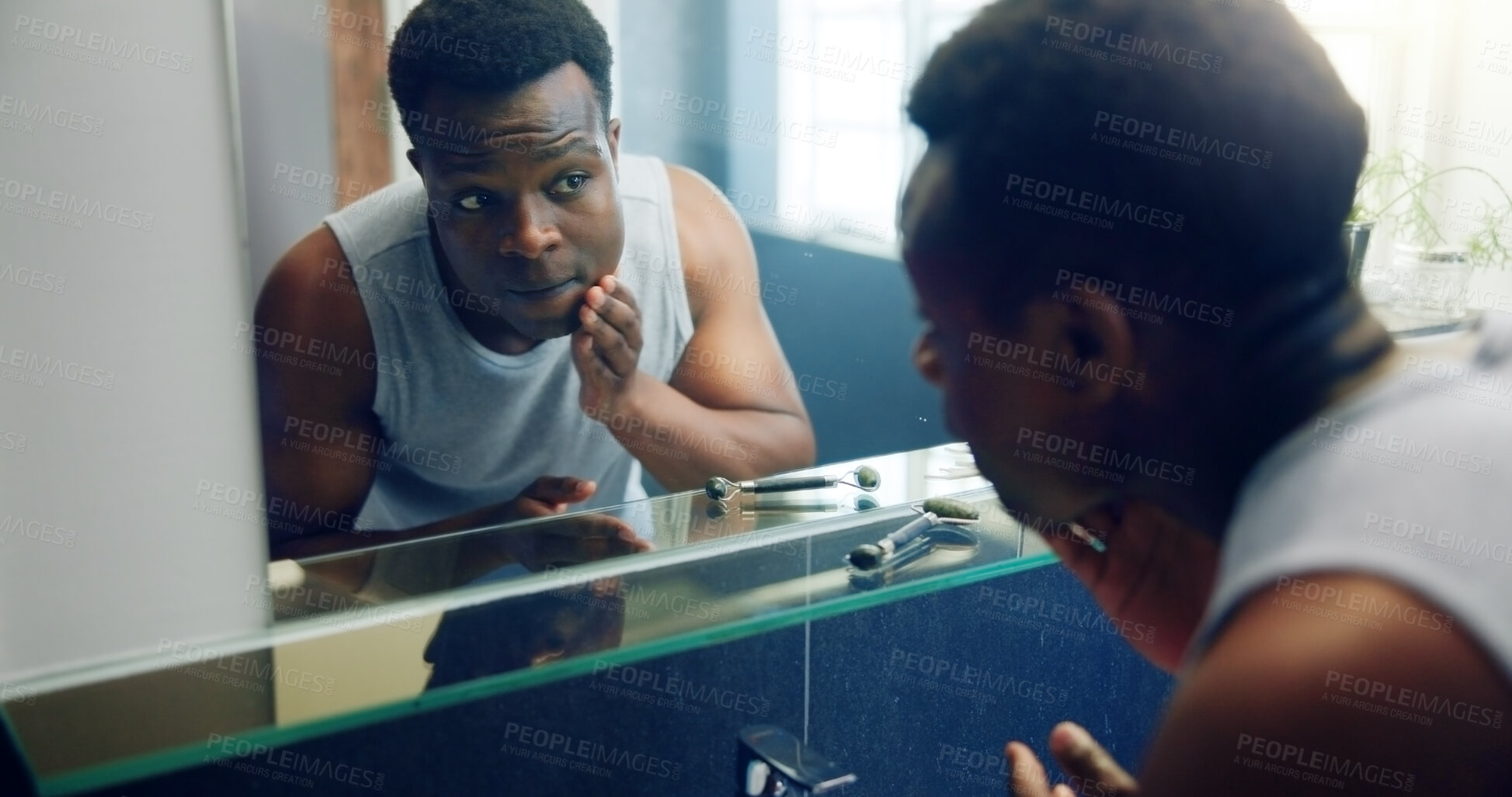 Buy stock photo African man, bathroom mirror and inspection for skin with results, reflection and shaving with grooming in home. Person, glow and facial change in morning with thinking, hygiene or cosmetics at house