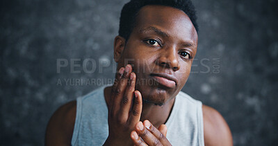 Buy stock photo Black man, skincare and portrait with hands in bathroom results, glow and change in morning. Person, touch and smooth with natural cosmetics, wellness or facial transformation at apartment in Nigeria