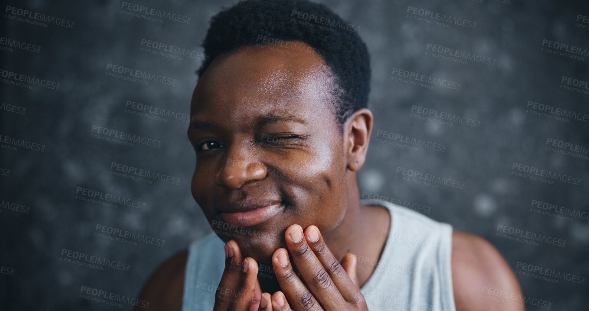 Buy stock photo African man, skincare and portrait with check for results, glow and change with smile in morning. Person, happy and wink with cosmetics, wellness and facial transformation at apartment in Nigeria