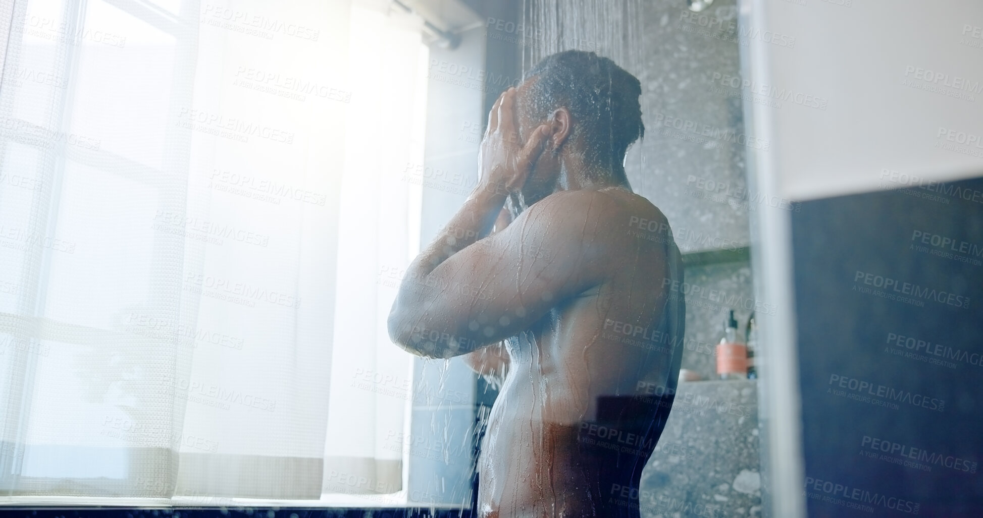 Buy stock photo Glass, person and shower in bathroom for hygiene, routine and washing body in morning at apartment. Man, water and cleaning skin for bacteria, dermatology and grooming process for wellness in home
