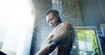 Buy stock photo Black man, shower and foam in bathroom, home or washing body for hygiene with low angle in morning. Person, water and cleaning skin with routine, soap and grooming process for bacteria at apartment