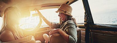 Buy stock photo Happy women, high five and sunset with car for road trip, travel or holiday getaway together. Banner, female people or friends with lens flare or vehicle for summer vacation, adventure or journey