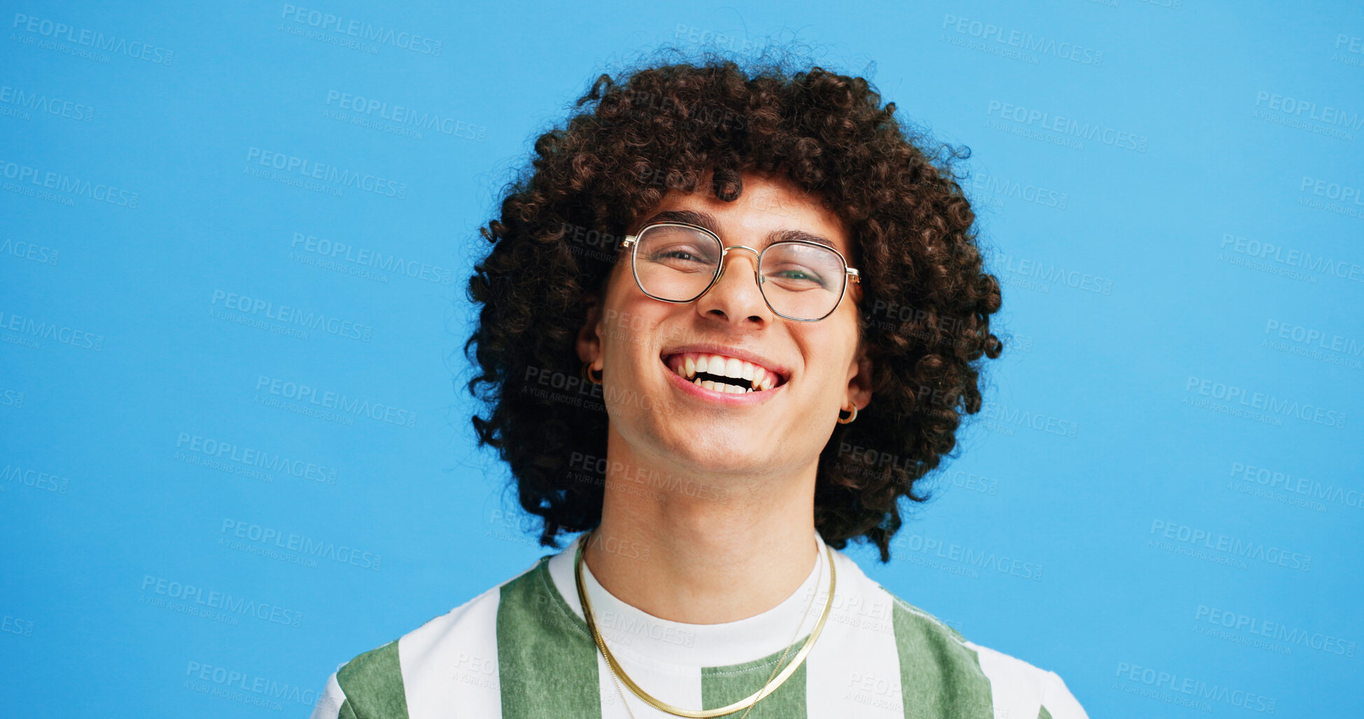 Buy stock photo Vision, portrait and man with glasses in studio, wellness and satisfied with prescription for eye care. Blue background, male person or pride with smile for spectacles, optical health or mockup space