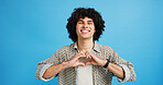 Studio, happy man and portrait with hands for heart, emoji shape and celebration for valentines day. Smile, male person and romantic gesture by blue background for love, support or kindness by mockup