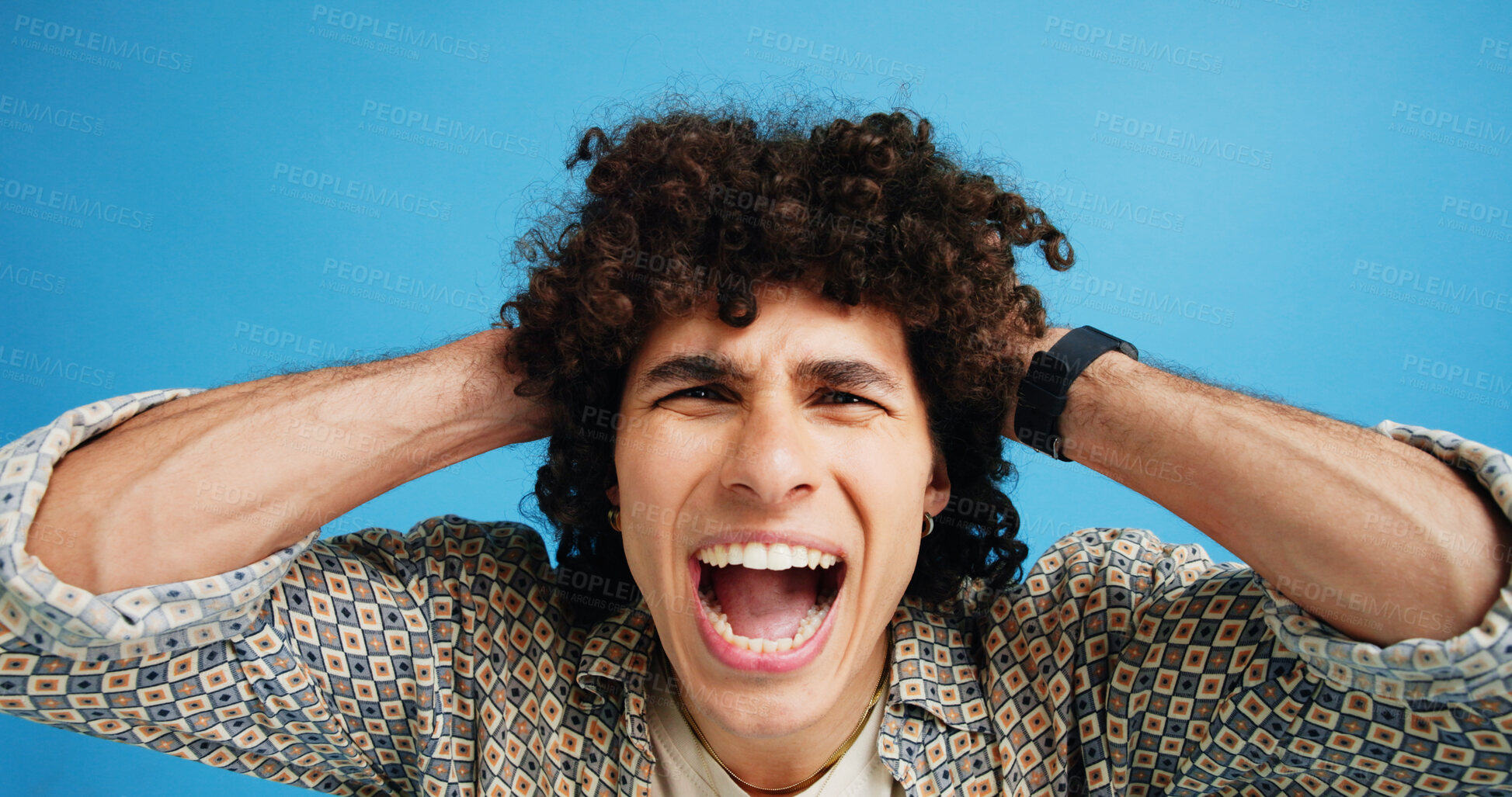 Buy stock photo Frustrated man, portrait and shouting with afro for bad hair, crisis or mental breakdown on a blue studio background. Male person, gen z or angry model screaming or yelling with curly hairstyle
