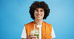 Studio, man and portrait with smoothie for drink, digestive health and fruit juice in recycled plastic. Mockup space, nutritionist and smile with green shake for diet, nutrition and blue background