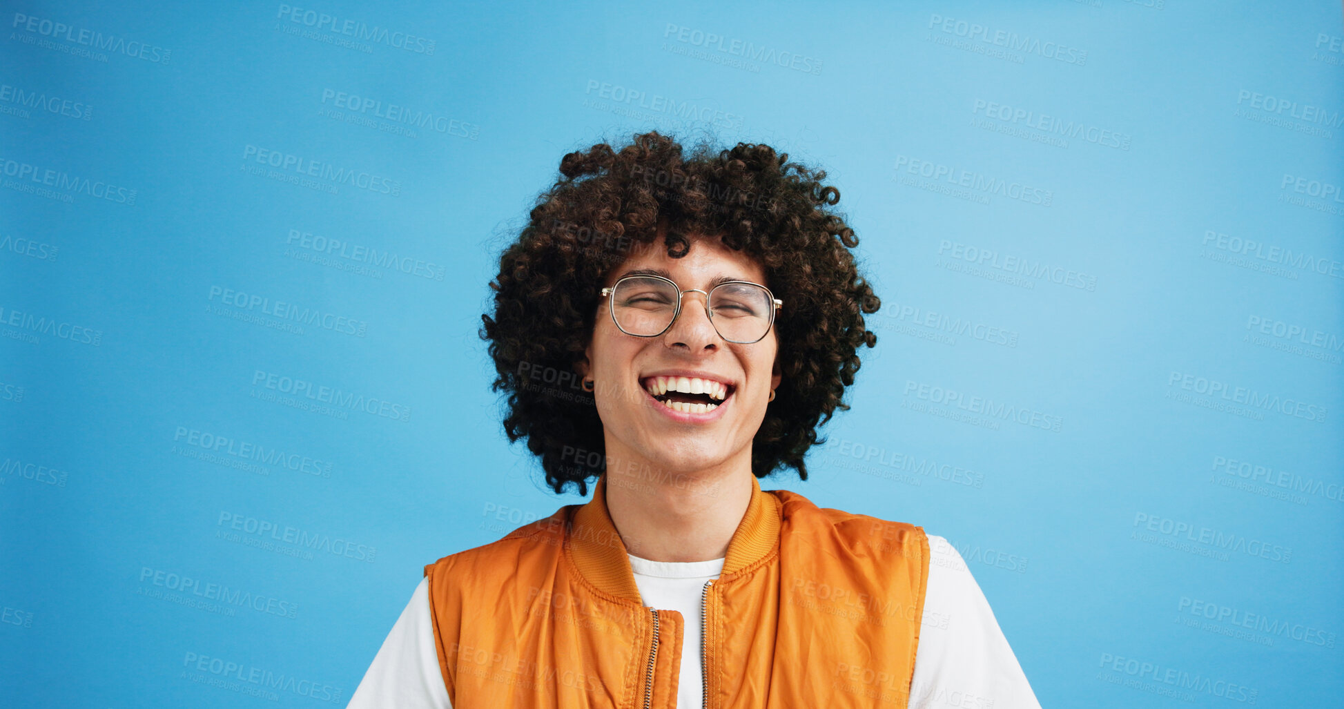 Buy stock photo Studio, laugh and man with glasses for vision, wellness and satisfied with prescription for eye care. Blue background, male person or portrait with spectacles for lens, optical health or mockup space