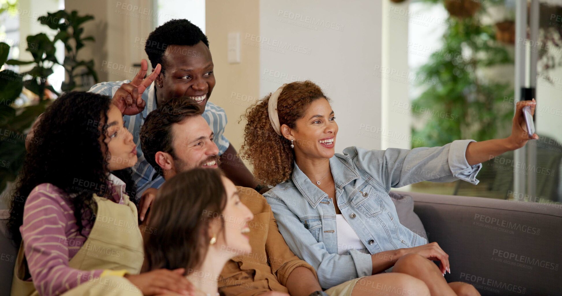Buy stock photo Friends, excited and selfie for football game, socializing and reunion in living room on couch. Diverse group, people and happy for soccer streaming, social media update and smiling for photography