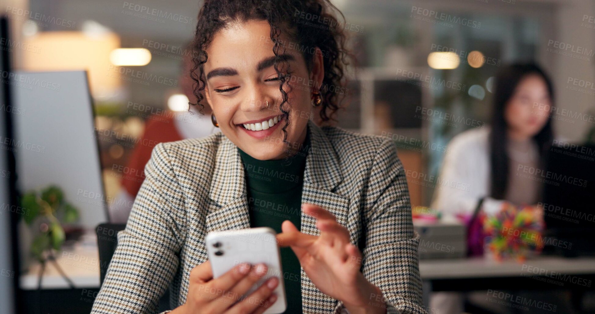 Buy stock photo Smile, phone and online with business woman in office for overtime, client communication and positive review. Happy, achievement and feedback with person at night for promotion news and approval