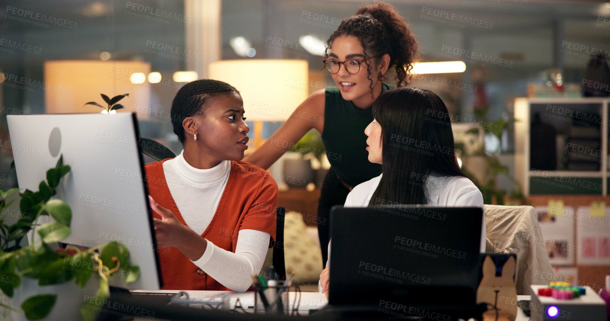 Buy stock photo Employees, computer and planning in office at night, magazine editor and manager for helping staff. Women, publishing agency and online for cover design, talking and brainstorming and project ideas