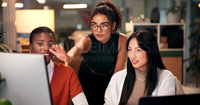 Buy stock photo Employees, computer and discussion in office at night, magazine editor and manager for helping staff. Women, publishing agency and online for cover design, talking and brainstorming and project plan