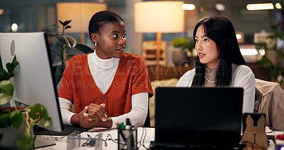 Buy stock photo Teamwork, computer and discussion with business people in office for tech startup, web design and overtime. Homepage developer, collaboration and deadline with women in digital agency at night