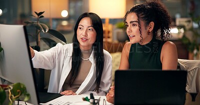 Buy stock photo Teamwork, computer and pointing with business people in office for tech startup, web design and research overtime. Software developer, collaboration and deadline with women in digital agency at night