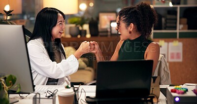 Buy stock photo Business women, night and fist bump with teamwork for congratulations, thank you or success at office. Creative, female people or colleagues working late with smile for good job, well done or winning