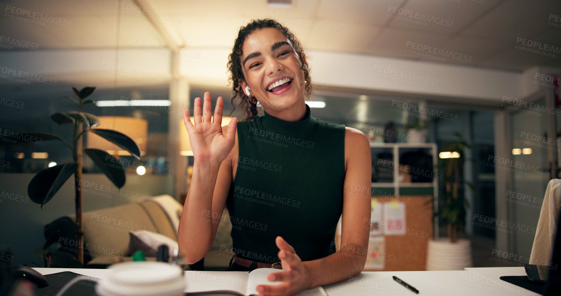 Buy stock photo Business woman, portrait and night with wave for video call, online conference or webinar at office desk. Female person, tutor or virtual assistant working late in POV with smile for communication