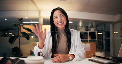 Buy stock photo Asian woman, portrait and night with wave for video call, online conference or webinar at office desk. Female person, tutor or virtual assistant working late in POV with smile for communication