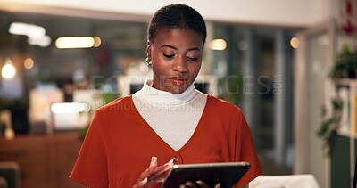 Buy stock photo Tablet, research and reading with business black woman in office for public relation campaign, overtime and typing. Press release, deadline and news update with person in media agency at night