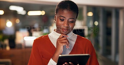 Buy stock photo Tablet, thinking and reading with business black woman in office for public relation campaign, overtime and research. Press release, deadline and brainstorming with person in media agency at night