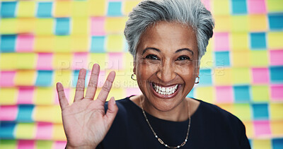 Buy stock photo Woman, happy and wave in agency for video call, introduction and welcome to design webinar. Mature designer, portrait and excited at office sticky notes for online meeting, POV and calendar schedule