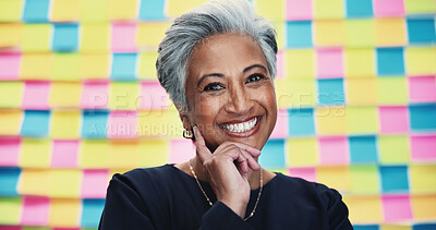 Buy stock photo Mature woman, portrait and creative with colorful background for design, textile or development in studio. Business, female person or Indian designer with smile for career ambition or job creativity