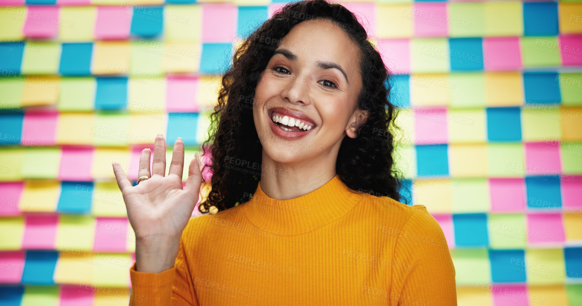 Buy stock photo Happy woman, portrait and wave with video call on a colorful background for creative webinar in studio. Female person, designer or hello with smile, POV or textile for art introduction or design wall