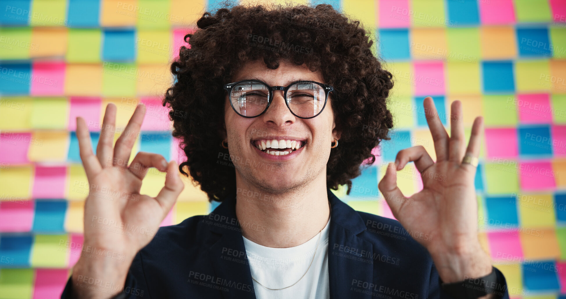 Buy stock photo Happy man, glasses or approval sign with planning for creative project, review or office agenda in portrait. Designer, smile or like emoji at sticky note background for OK, vision or new opportunity