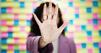 Woman, hand and stop with rejection on colorful background for no, refusal or objection in studio. Closeup, female person or warning with gesture or prohibition for denial, decline or protection
